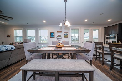 Welcome home to the luxury neighborhood of The Hammocks in Cane on Cypress Point Par 3 in South Carolina - for sale on GolfHomes.com, golf home, golf lot