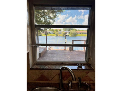 Amazing 3-bedroom, 2-bath waterfront villa/townhouse with on Miccosukee Golf and Country Club in Florida - for sale on GolfHomes.com, golf home, golf lot