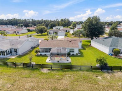 This open floor plan Laredo offers the kind of privacy that's on Glenview Championship Golf and Country Club in Florida - for sale on GolfHomes.com, golf home, golf lot