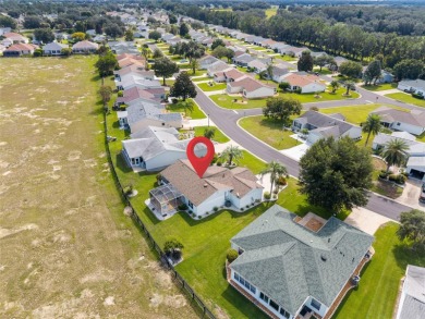 This open floor plan Laredo offers the kind of privacy that's on Glenview Championship Golf and Country Club in Florida - for sale on GolfHomes.com, golf home, golf lot