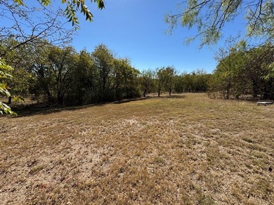 Build your dream home on this prime 1.54-acre homesite in the on Tangle Ridge Golf Club in Texas - for sale on GolfHomes.com, golf home, golf lot