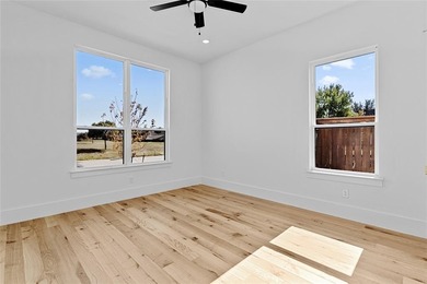 Experience modern luxury living in this stunning 3,386 sq ft new on Southern Oaks Golf Club in Texas - for sale on GolfHomes.com, golf home, golf lot