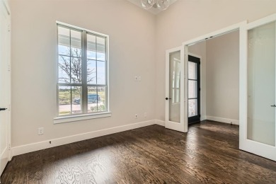 Welcome to this stunning 4-bedroom, 4.5-bathroom house, nestled on The Tribute At the Colony in Texas - for sale on GolfHomes.com, golf home, golf lot