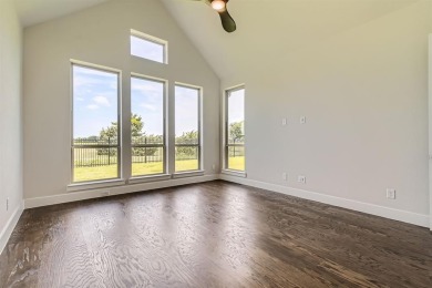 Welcome to this stunning 4-bedroom, 4.5-bathroom house, nestled on The Tribute At the Colony in Texas - for sale on GolfHomes.com, golf home, golf lot