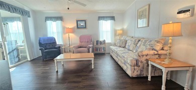 Come take a tour of this beautifully maintained 2 bed, 2 bath on Polo Park East in Florida - for sale on GolfHomes.com, golf home, golf lot