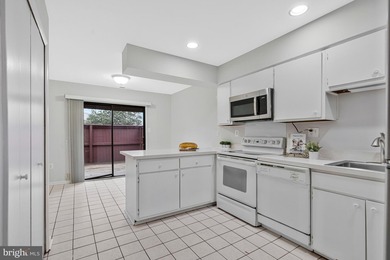 Welcome to this contemporary two**aEUR~level townhome in the on Reston National Golf Course in Virginia - for sale on GolfHomes.com, golf home, golf lot