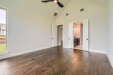 Welcome to this stunning 4-bedroom, 4.5-bathroom house, nestled on The Tribute At the Colony in Texas - for sale on GolfHomes.com, golf home, golf lot