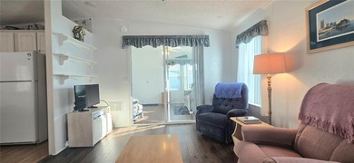 Come take a tour of this beautifully maintained 2 bed, 2 bath on Polo Park East in Florida - for sale on GolfHomes.com, golf home, golf lot