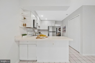 Welcome to this contemporary two**aEUR~level townhome in the on Reston National Golf Course in Virginia - for sale on GolfHomes.com, golf home, golf lot