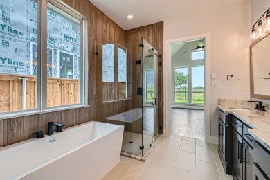 Welcome to this stunning 4-bedroom, 4.5-bathroom house, nestled on The Tribute At the Colony in Texas - for sale on GolfHomes.com, golf home, golf lot