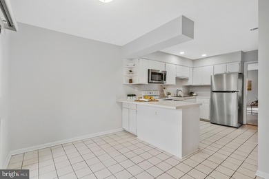 Welcome to this contemporary two**aEUR~level townhome in the on Reston National Golf Course in Virginia - for sale on GolfHomes.com, golf home, golf lot