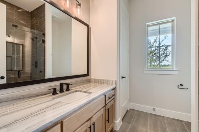 Welcome to this stunning 4-bedroom, 4.5-bathroom house, nestled on The Tribute At the Colony in Texas - for sale on GolfHomes.com, golf home, golf lot