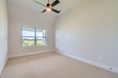 Welcome to this stunning 4-bedroom, 4.5-bathroom house, nestled on The Tribute At the Colony in Texas - for sale on GolfHomes.com, golf home, golf lot