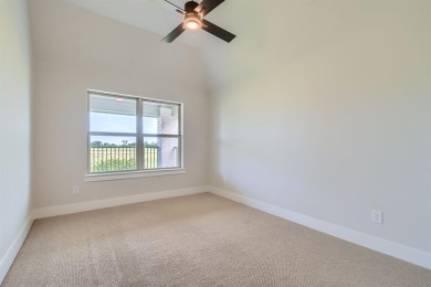 Welcome to this stunning 4-bedroom, 4.5-bathroom house, nestled on The Tribute At the Colony in Texas - for sale on GolfHomes.com, golf home, golf lot