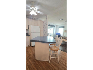 Come take a tour of this beautifully maintained 2 bed, 2 bath on Polo Park East in Florida - for sale on GolfHomes.com, golf home, golf lot