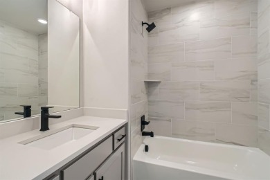 Welcome to this stunning 4-bedroom, 4.5-bathroom house, nestled on The Tribute At the Colony in Texas - for sale on GolfHomes.com, golf home, golf lot