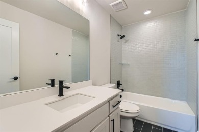 Welcome to this stunning 4-bedroom, 4.5-bathroom house, nestled on The Tribute At the Colony in Texas - for sale on GolfHomes.com, golf home, golf lot