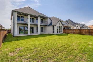 Welcome to this stunning 4-bedroom, 4.5-bathroom house, nestled on The Tribute At the Colony in Texas - for sale on GolfHomes.com, golf home, golf lot