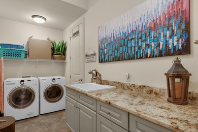 PRICE REDUCED with a MOTIVATED SELLER! This Mediterranean home on Regatta Bay Golf and Country Club in Florida - for sale on GolfHomes.com, golf home, golf lot