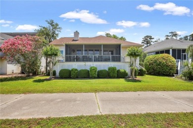 Enjoy beautiful sunsets and marsh views from the back porch on Sea Palms Golf and Tennis Resort in Georgia - for sale on GolfHomes.com, golf home, golf lot