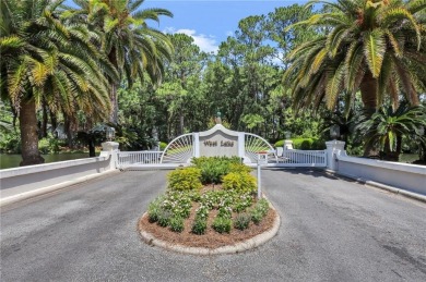 Enjoy beautiful sunsets and marsh views from the back porch on Sea Palms Golf and Tennis Resort in Georgia - for sale on GolfHomes.com, golf home, golf lot