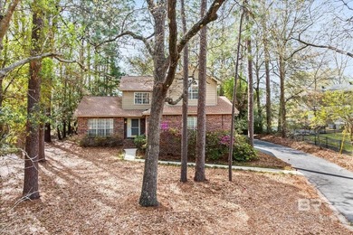 Perfectly positioned on an oversized golf course lot in the on Lake Forest Yacht and Country Club in Alabama - for sale on GolfHomes.com, golf home, golf lot