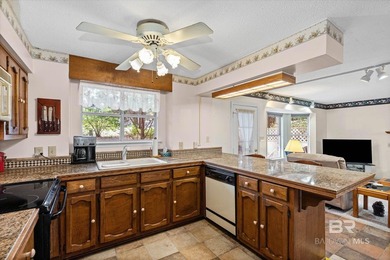 Perfectly positioned on an oversized golf course lot in the on Lake Forest Yacht and Country Club in Alabama - for sale on GolfHomes.com, golf home, golf lot