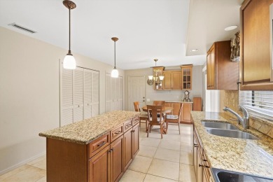 Golf lover's dream--this move-in ready home is priced to sell on Peridia Golf and Country Club in Florida - for sale on GolfHomes.com, golf home, golf lot