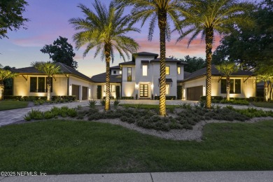 A custom home with panoramic Intracoastal views behind the gates on Queens Harbour Yacht and Country Club in Florida - for sale on GolfHomes.com, golf home, golf lot