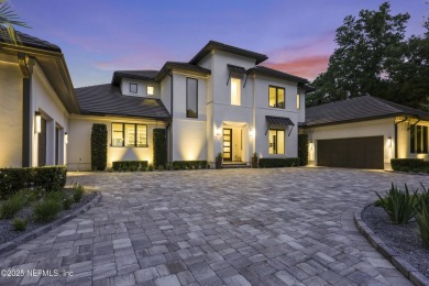 A custom home with panoramic Intracoastal views behind the gates on Queens Harbour Yacht and Country Club in Florida - for sale on GolfHomes.com, golf home, golf lot
