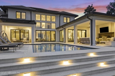 A custom home with panoramic Intracoastal views behind the gates on Queens Harbour Yacht and Country Club in Florida - for sale on GolfHomes.com, golf home, golf lot