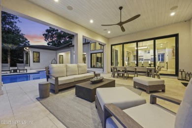 A custom home with panoramic Intracoastal views behind the gates on Queens Harbour Yacht and Country Club in Florida - for sale on GolfHomes.com, golf home, golf lot