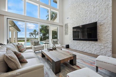 A custom home with panoramic Intracoastal views behind the gates on Queens Harbour Yacht and Country Club in Florida - for sale on GolfHomes.com, golf home, golf lot