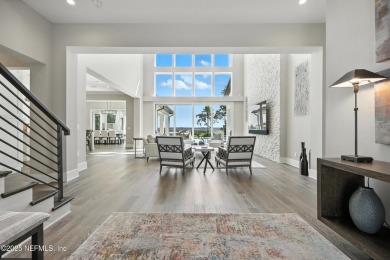 A custom home with panoramic Intracoastal views behind the gates on Queens Harbour Yacht and Country Club in Florida - for sale on GolfHomes.com, golf home, golf lot