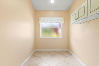 Golf lover's dream--this move-in ready home is priced to sell on Peridia Golf and Country Club in Florida - for sale on GolfHomes.com, golf home, golf lot
