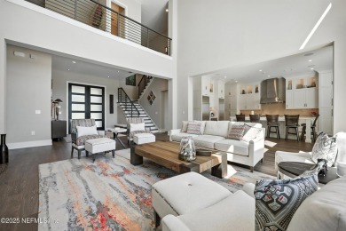 A custom home with panoramic Intracoastal views behind the gates on Queens Harbour Yacht and Country Club in Florida - for sale on GolfHomes.com, golf home, golf lot