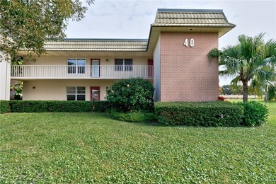 Welcome to this updated first-floor end-unit in desirable Vista on Vero Beach South Golf Course in Florida - for sale on GolfHomes.com, golf home, golf lot