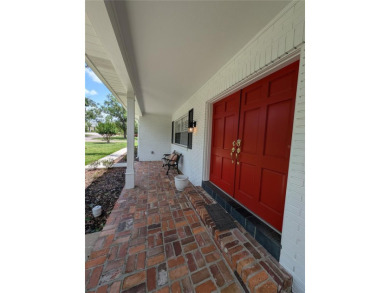 Beautiful estate home on a corner lot in Temple Terrace Estates on Temple Terrace Golf and Country Club in Florida - for sale on GolfHomes.com, golf home, golf lot