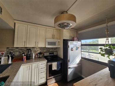 Spacious unit overlooking Golf Course. Open floor plan with on The Country Club At Boca Raton in Florida - for sale on GolfHomes.com, golf home, golf lot