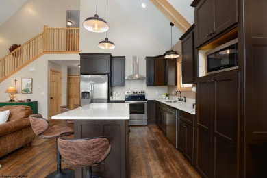 Welcome to 'Suncrest Chalet', a nearly-new escape nestled inside on Alpine Lake Resort in West Virginia - for sale on GolfHomes.com, golf home, golf lot