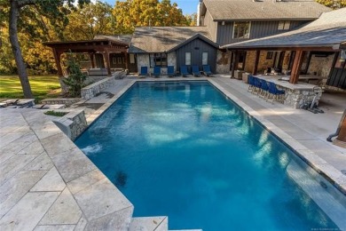 This custom contemporary estate is a truly unique offering in on Southern Hills Country Club in Oklahoma - for sale on GolfHomes.com, golf home, golf lot