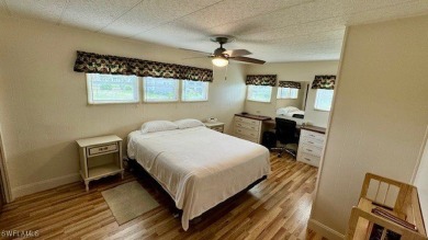 This charming single family home boasts 2 bedrooms, 2 bathrooms on Riverbend Golf and Country Club in Florida - for sale on GolfHomes.com, golf home, golf lot