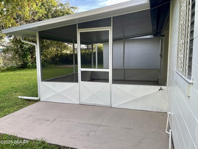 Adorable Concrete Block 3 Bedroom 2 bathroom home tucked away in on  in Florida - for sale on GolfHomes.com, golf home, golf lot