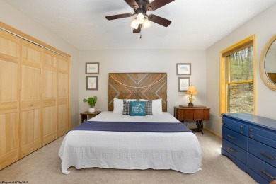 Welcome to 'Suncrest Chalet', a nearly-new escape nestled inside on Alpine Lake Resort in West Virginia - for sale on GolfHomes.com, golf home, golf lot