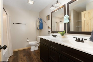 Welcome to 'Suncrest Chalet', a nearly-new escape nestled inside on Alpine Lake Resort in West Virginia - for sale on GolfHomes.com, golf home, golf lot