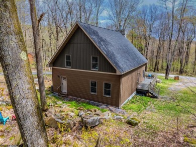 Welcome to 'Suncrest Chalet', a nearly-new escape nestled inside on Alpine Lake Resort in West Virginia - for sale on GolfHomes.com, golf home, golf lot