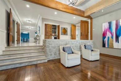 This custom contemporary estate is a truly unique offering in on Southern Hills Country Club in Oklahoma - for sale on GolfHomes.com, golf home, golf lot