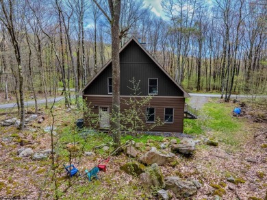 Welcome to 'Suncrest Chalet', a nearly-new escape nestled inside on Alpine Lake Resort in West Virginia - for sale on GolfHomes.com, golf home, golf lot