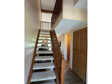 Step into luxury with this fully furnished and updated on Pointe Royale Village Country Club in Missouri - for sale on GolfHomes.com, golf home, golf lot