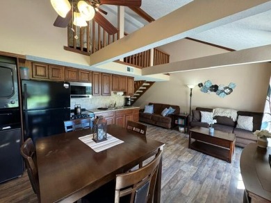 Step into luxury with this fully furnished and updated on Pointe Royale Village Country Club in Missouri - for sale on GolfHomes.com, golf home, golf lot